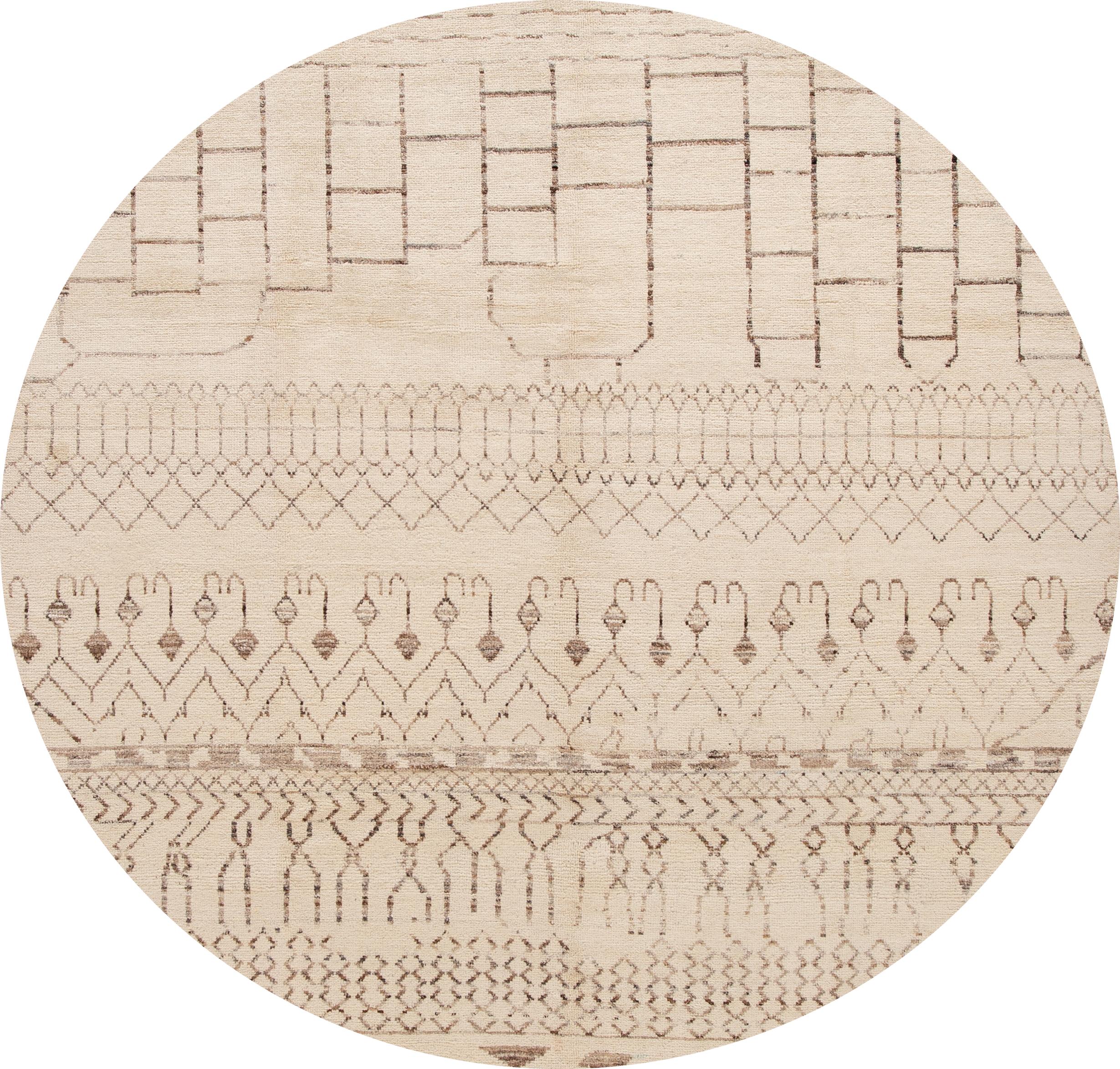Beautiful hand-knotted Modern Moroccan-Style wool rug with the beige field, and brown accents in an all-over Tribal design. 

This rug measures: 8' x 10'3
