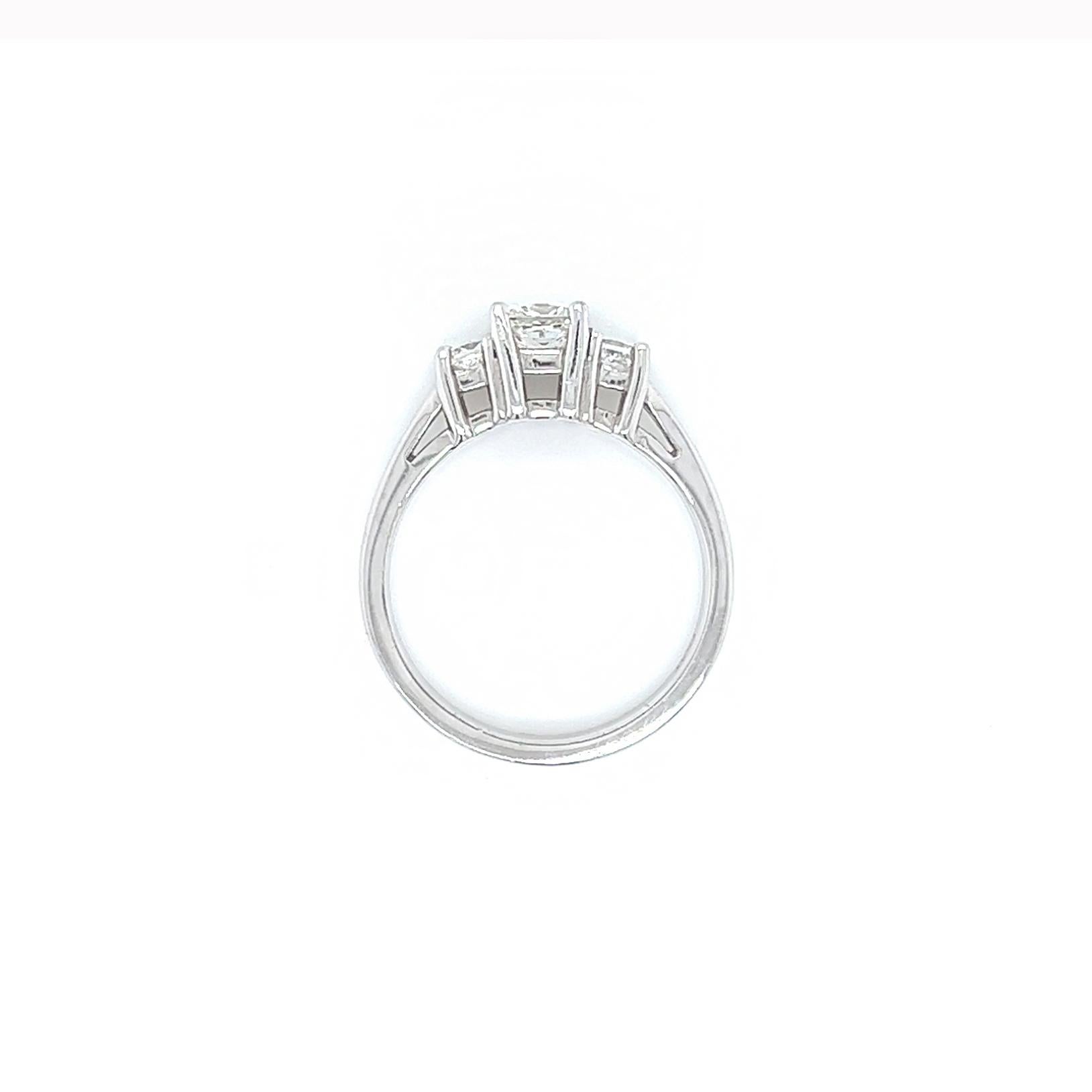 Beautiful Three Stone Diamond Ring in Platinum Band

-1.01 Carat Total Round Diamonds

-Center Diamond: 0.56Carat 

-2 Side Stones: 0.45Carat Total

- F-G Color, VS Clarity

-Metal: Platinum

-Ring Size: 6.5
