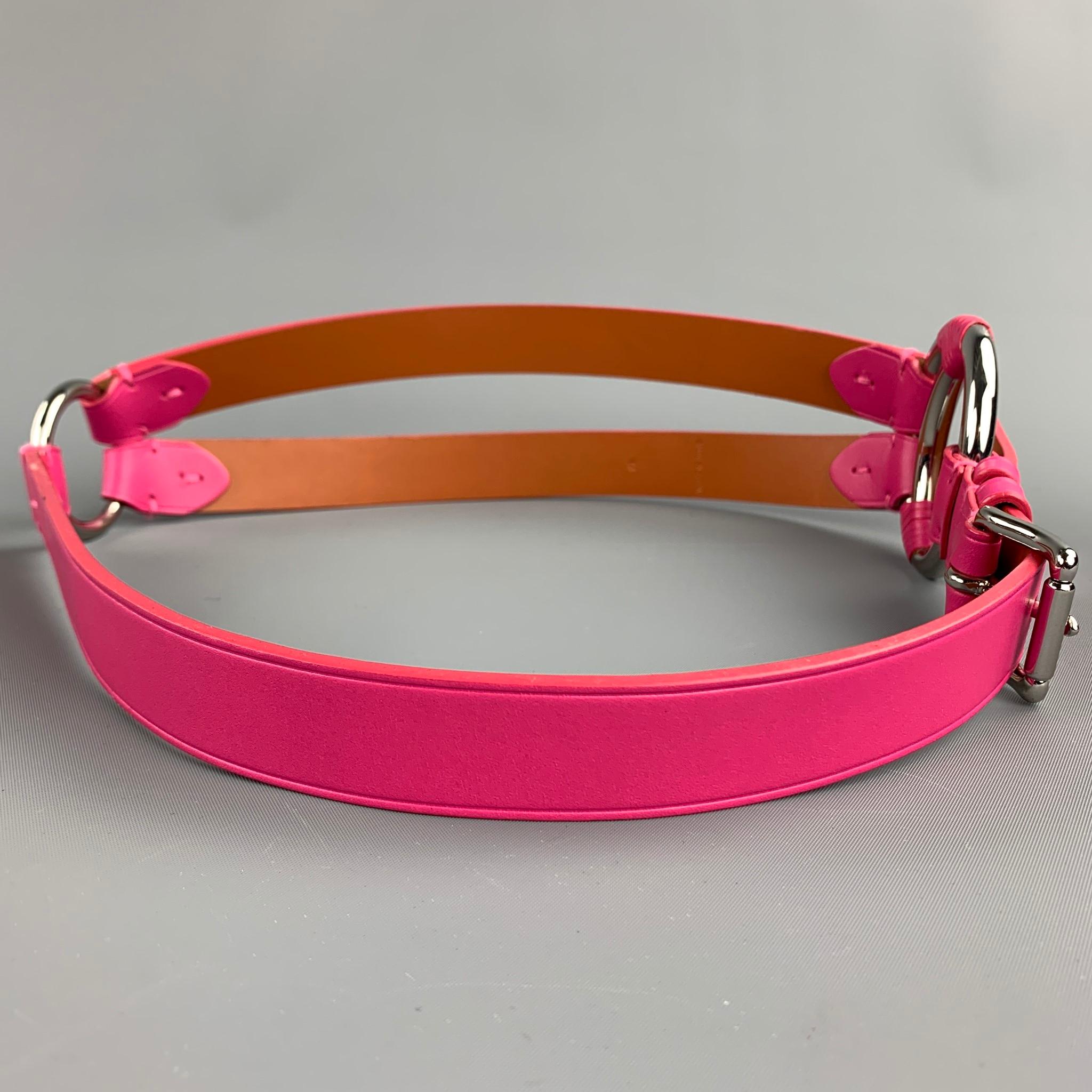 RALPH LAUREN belt comes in a pink leather with silver tone hardware and a buckle closure. 

Very Good Pre-Owned Condition.
Marked: M
Original Retail Price: $695.00

Length: 38 in.
Width: 1 in.
Fits: 32 in. - 34 in.