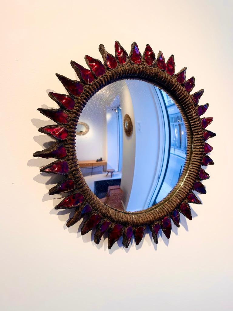 Circa 1950.
Talosel (resin) mirror with inlaid pieces of red mirrors
Signed 
