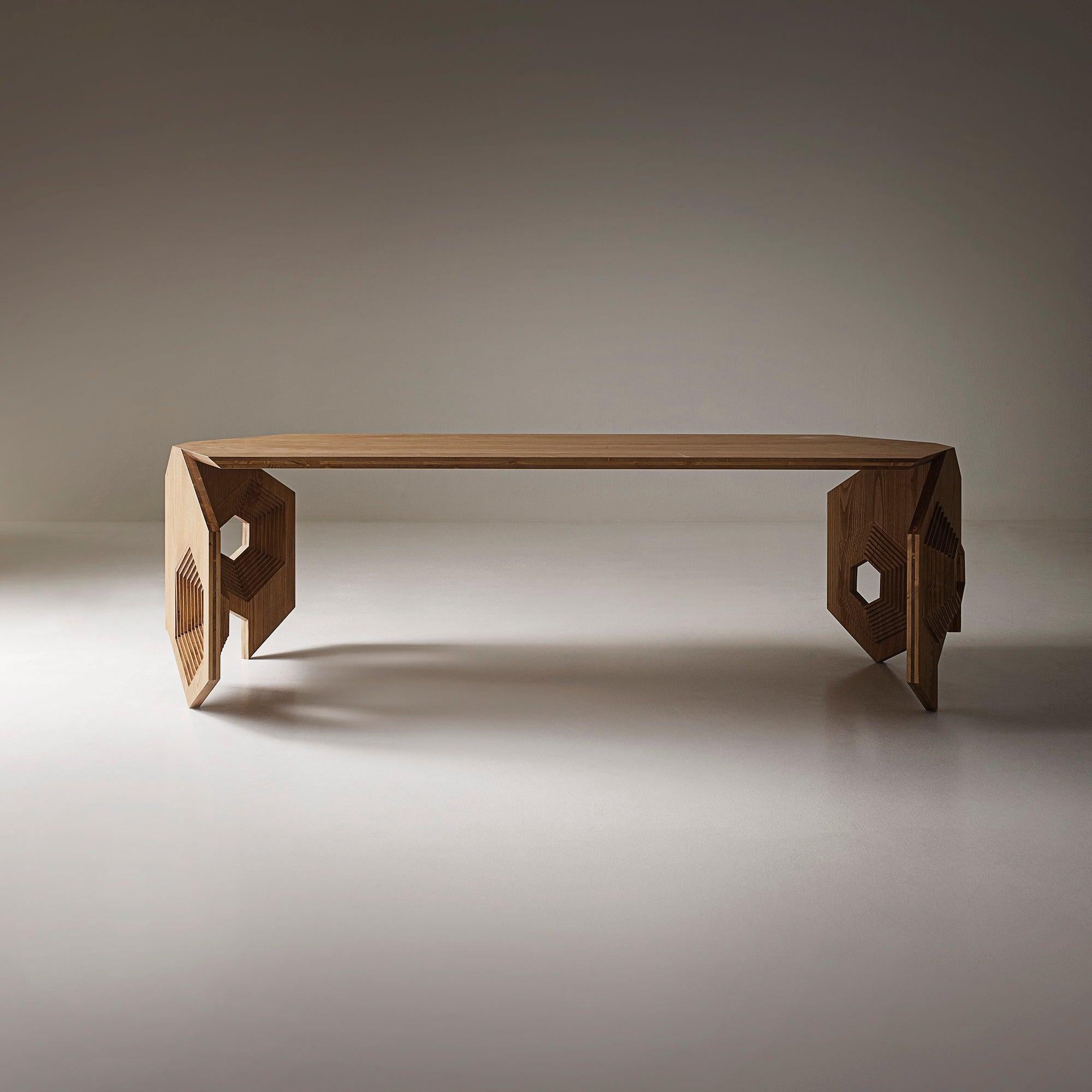 Cristoforo, with all its facets, well interprets the spirit of a free space and time traveller.
This sculptural and precious wood table is completely handcrafted in Italy by excellent artisans.
The processing that gives shape to the legs is an
