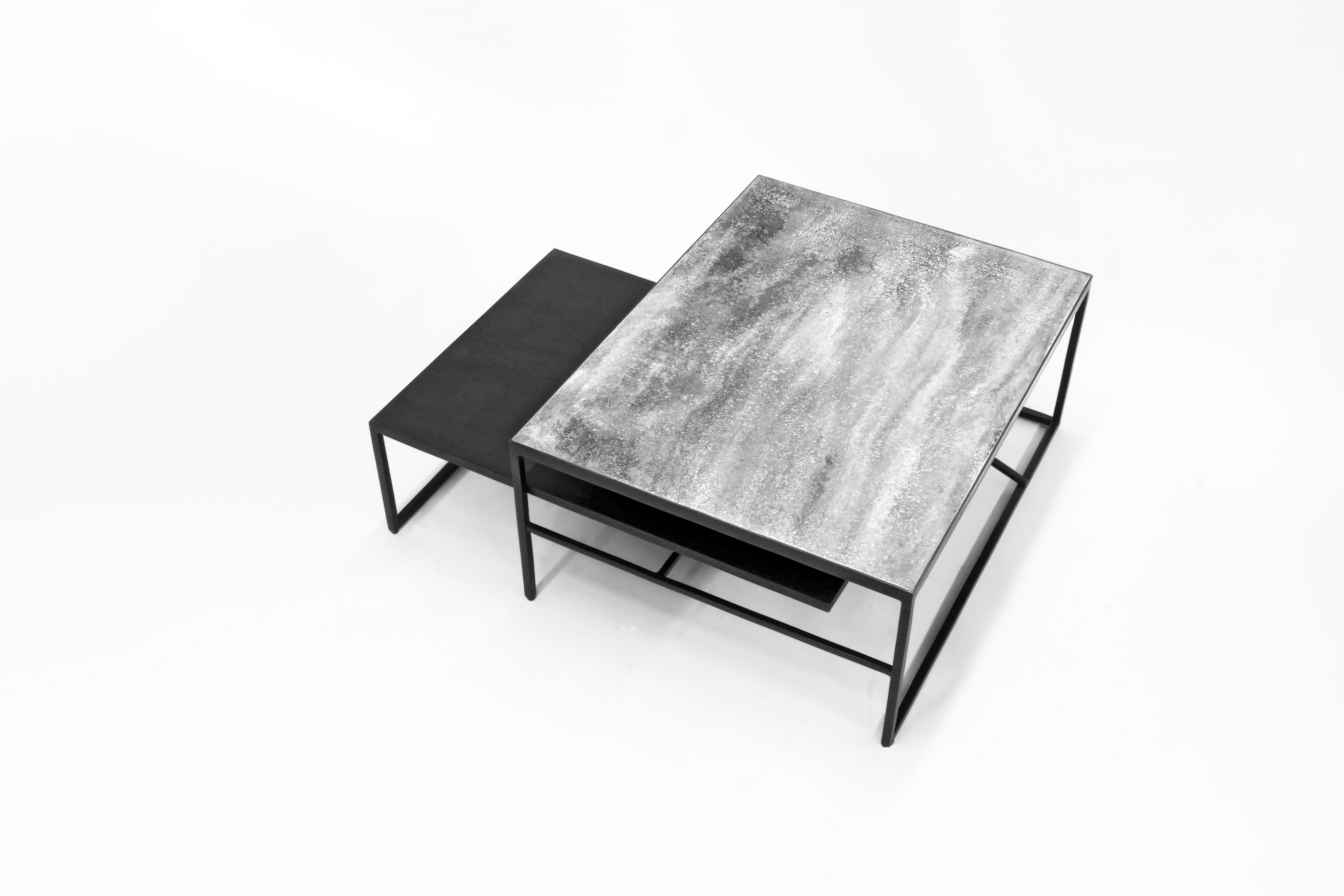 The floating steel coffee table, from Joshua Howe Design is a study in grace and geometry. The two tier design features a blackened steel lower surface that seems to defy gravity… Levitating below its poured concrete counterpart.

Made-to-order.
 