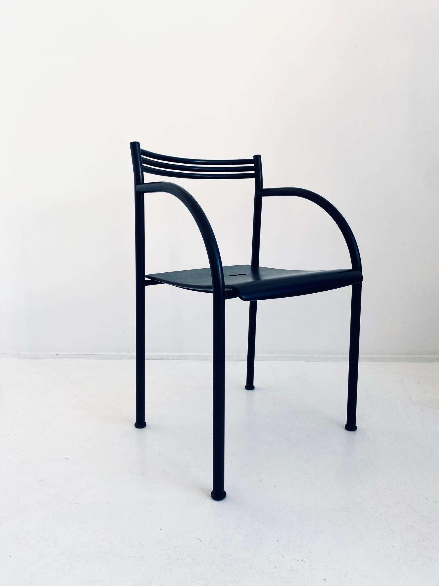Black coated metal frame with plastic seating.

Beautiful original condition, with some very minor flaws consisting with age. Very small spots with coating loss.

These chairs are called 'Francesca Spanish' after a character in the novel called