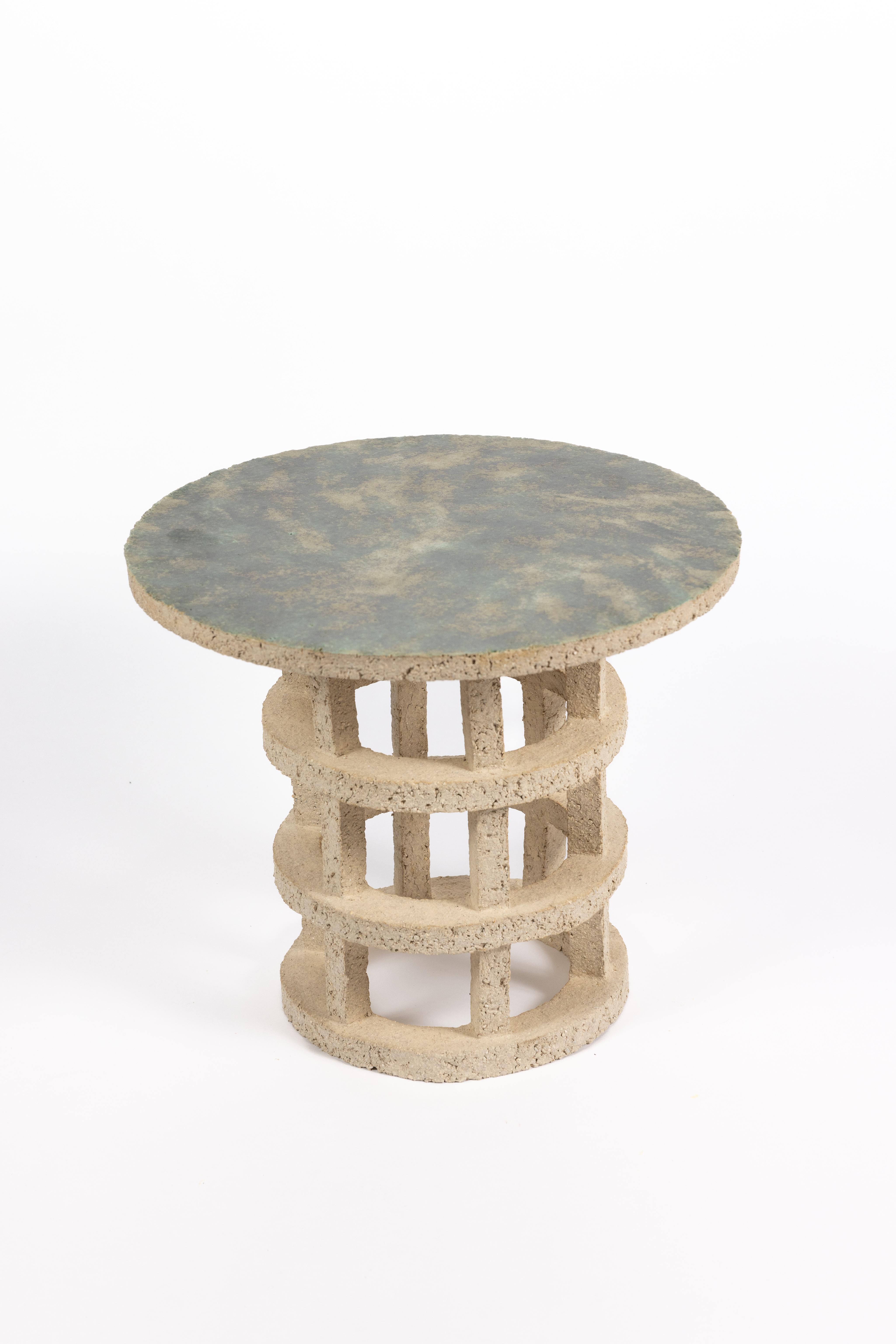 « Gloriette » table in raw stoneware with green glazed top by Denis Castaing.
Artist signature under the base. 2024.
H : 15.3 x 17.7 inches.