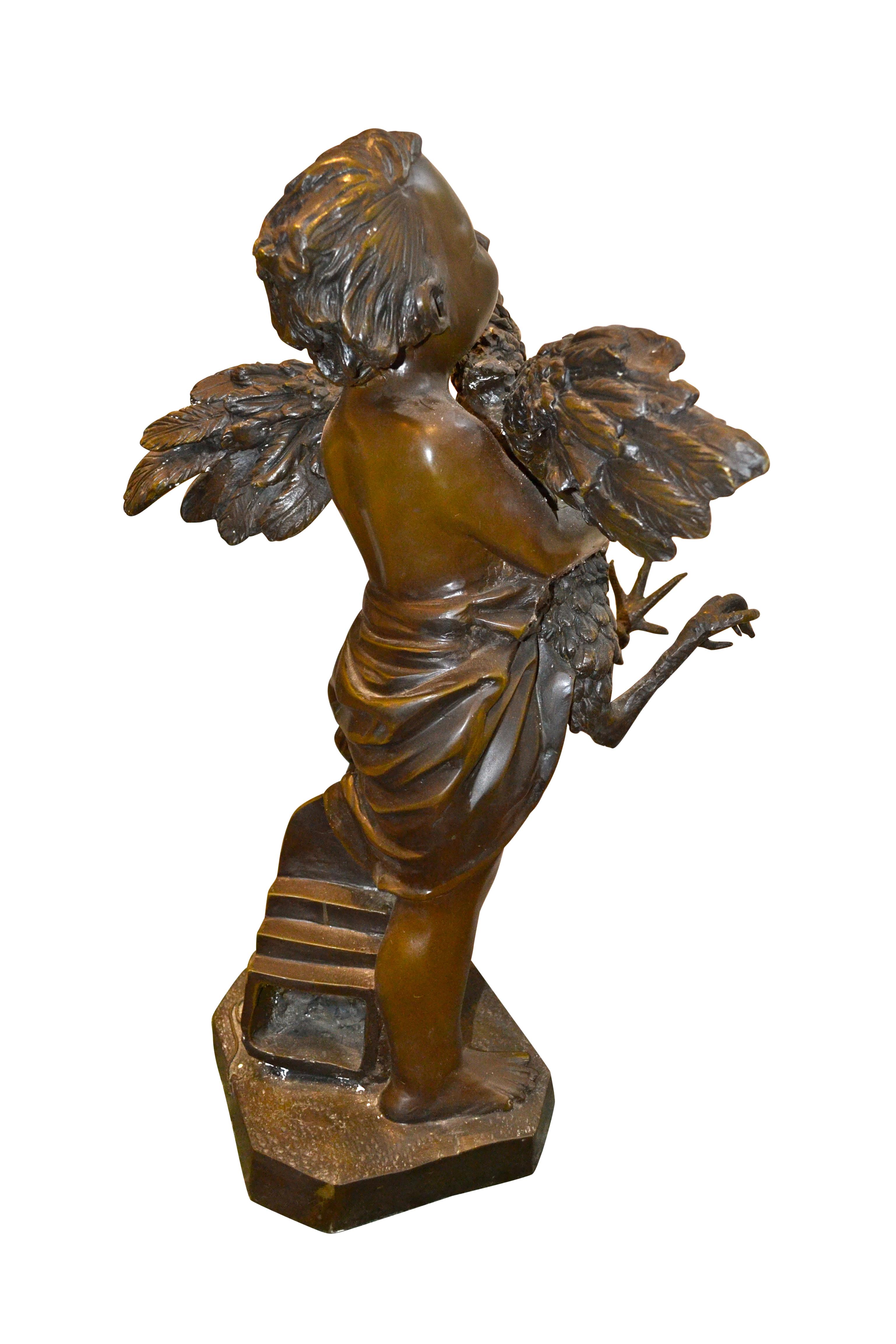 bronze boy on milk churn statue