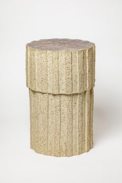 « Ostinato » table in raw stoneware with red glazed top by Denis Castaing, 2025.
