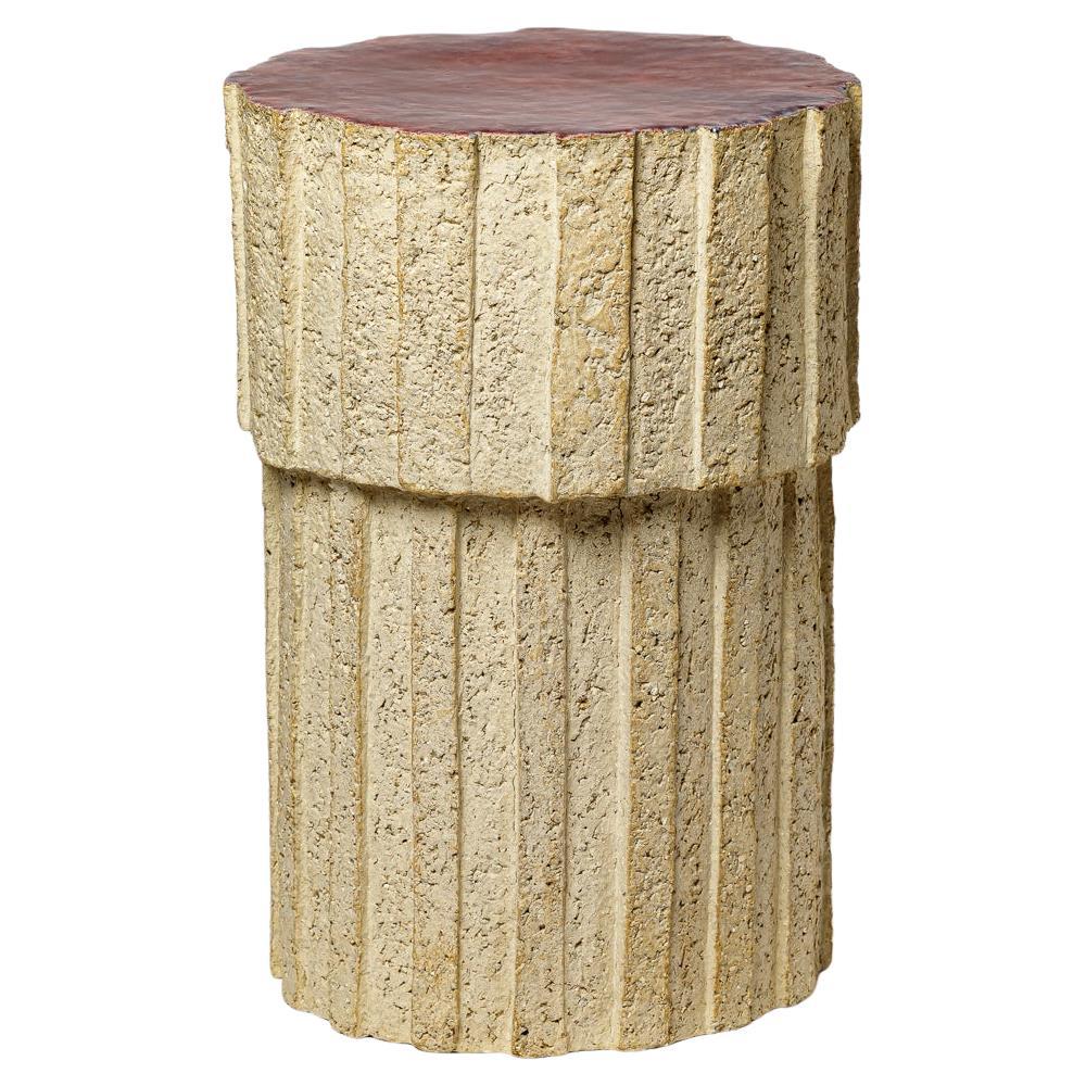 « Ostinato » table in raw stoneware with red glazed top by Denis Castaing, 2025.