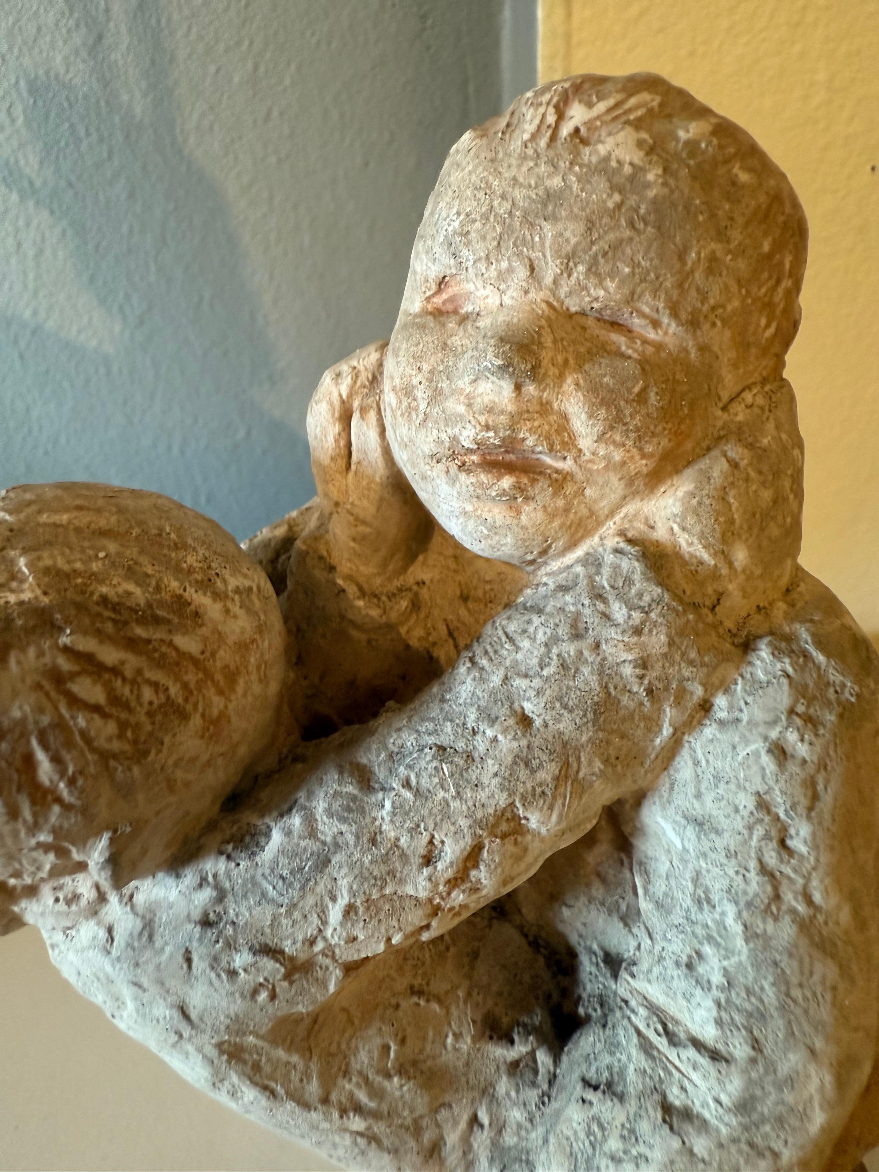 A dynamic sculpture by German artist Ludmilla Fischer-Pongratz (1899–1981), titled Raufende Buben (“Brawling Boys”). Executed in 1964, the work depicts two boys caught in a vigorous tussle, their intertwined bodies rendered in a raw, expressive