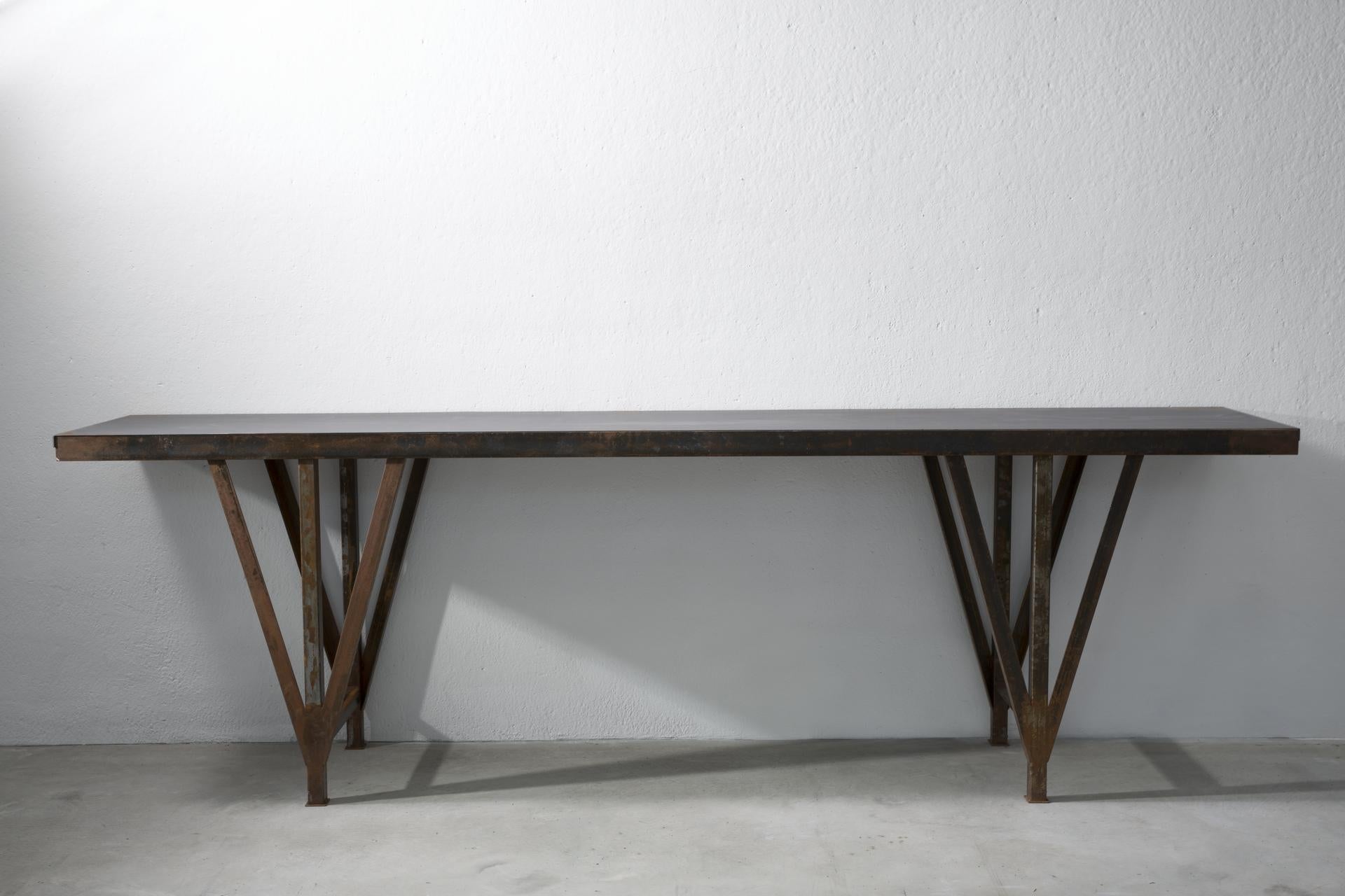 This console table called “SOLO” is made of steel and has a rust finish.
Single piece.  

Measures: Height x length x depth 90 x 232 x 51.5 cm

Imperfetto lab is a family. Verter Turroni, Emanuela Ravelli and their children Elia, Margherita and