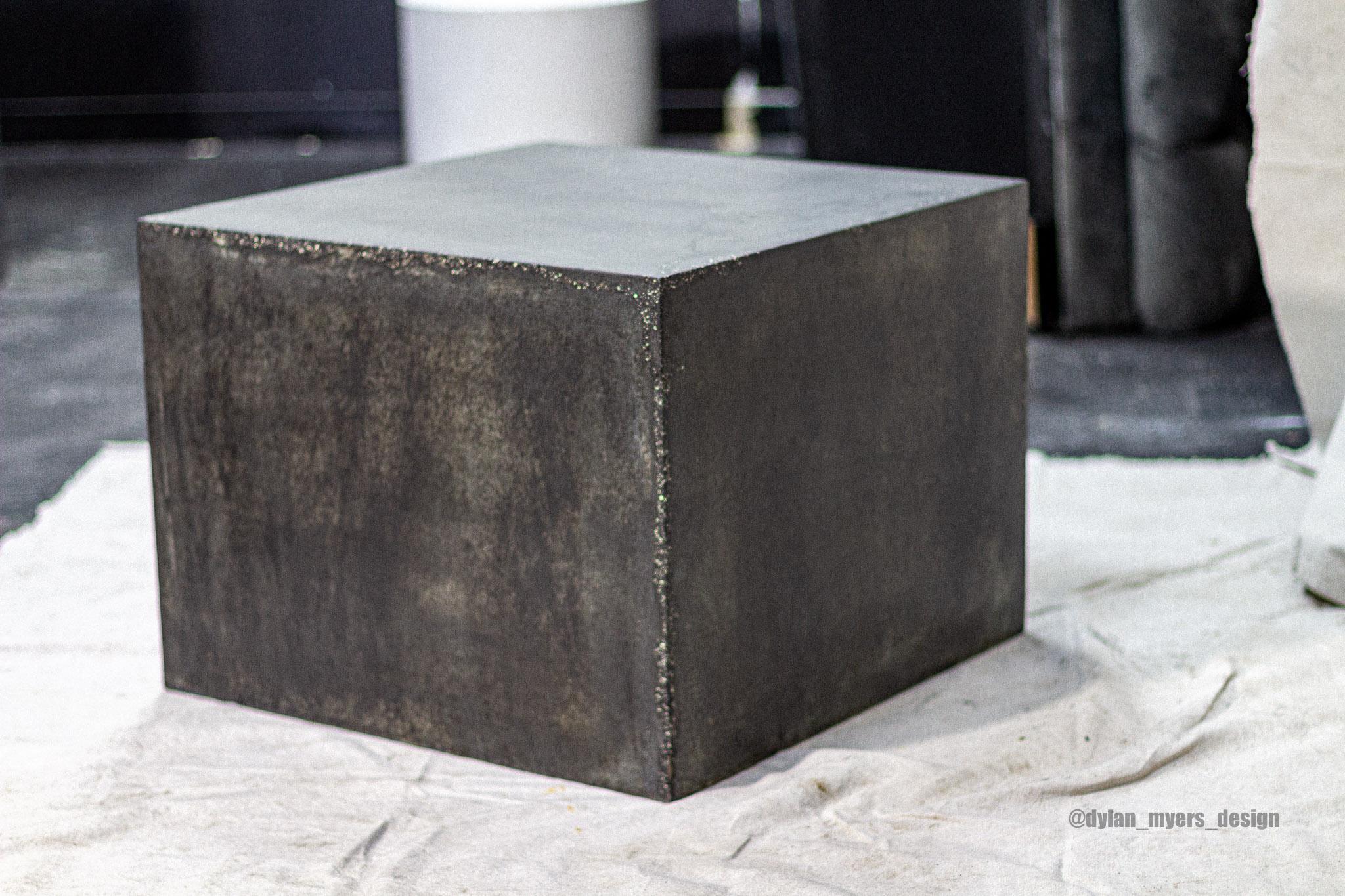 Envisioning a small cube of Black Carborundum with golden veins was Dylans' inspiration for 