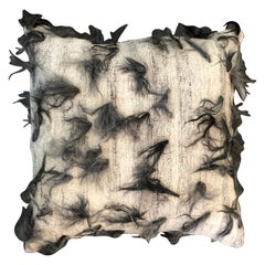 Coussin en laine gris et blanc « Unico » de Le Lampade