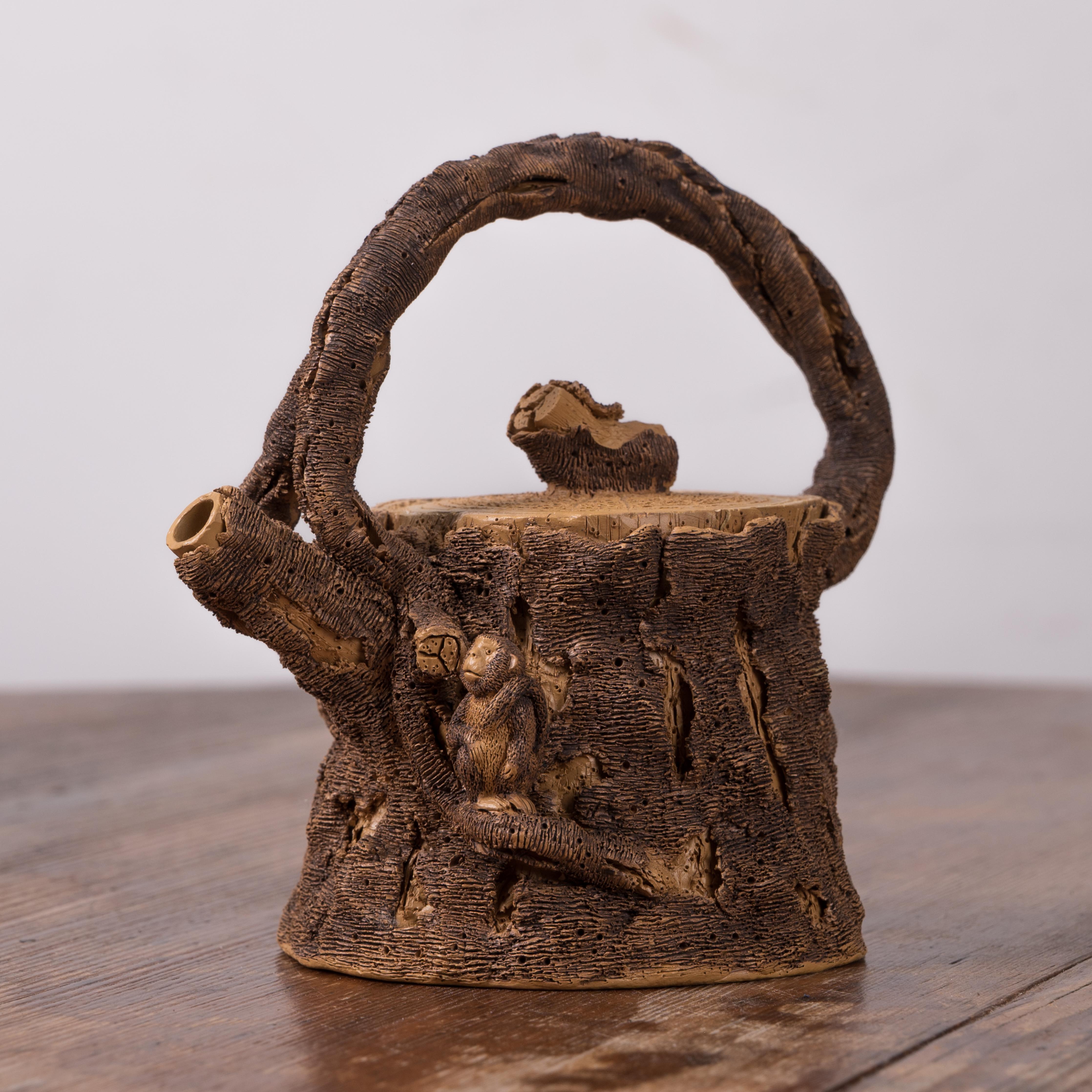 A Yixing Zisha ‘tree stump’ tea pot by 陳泰源 Chen Taiyuan (b.1963, Taiwan).

5 inches wide by 3 ⅜ inches deep by 4 ¾ inches tall



