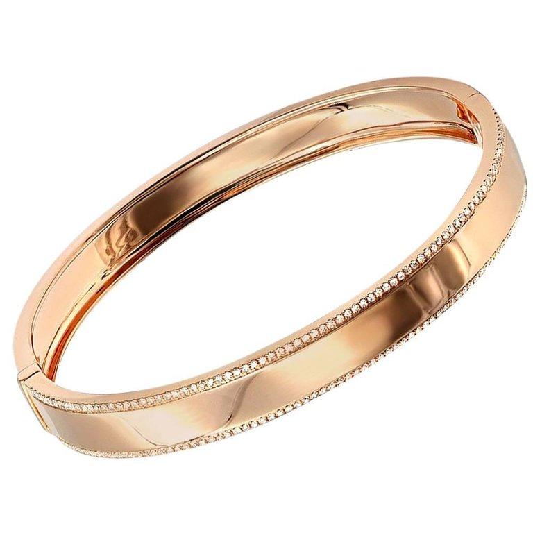 A wonderful new arrival for our beautiful ladies.
A Gorgeous Diamond Trimmed Rose Gold Bangle bracelet.
14K Rose Gold.
162 round brilliant diamonds handset in pave settings.
Total diamond weight  0.50CT.
21.85 Grams.