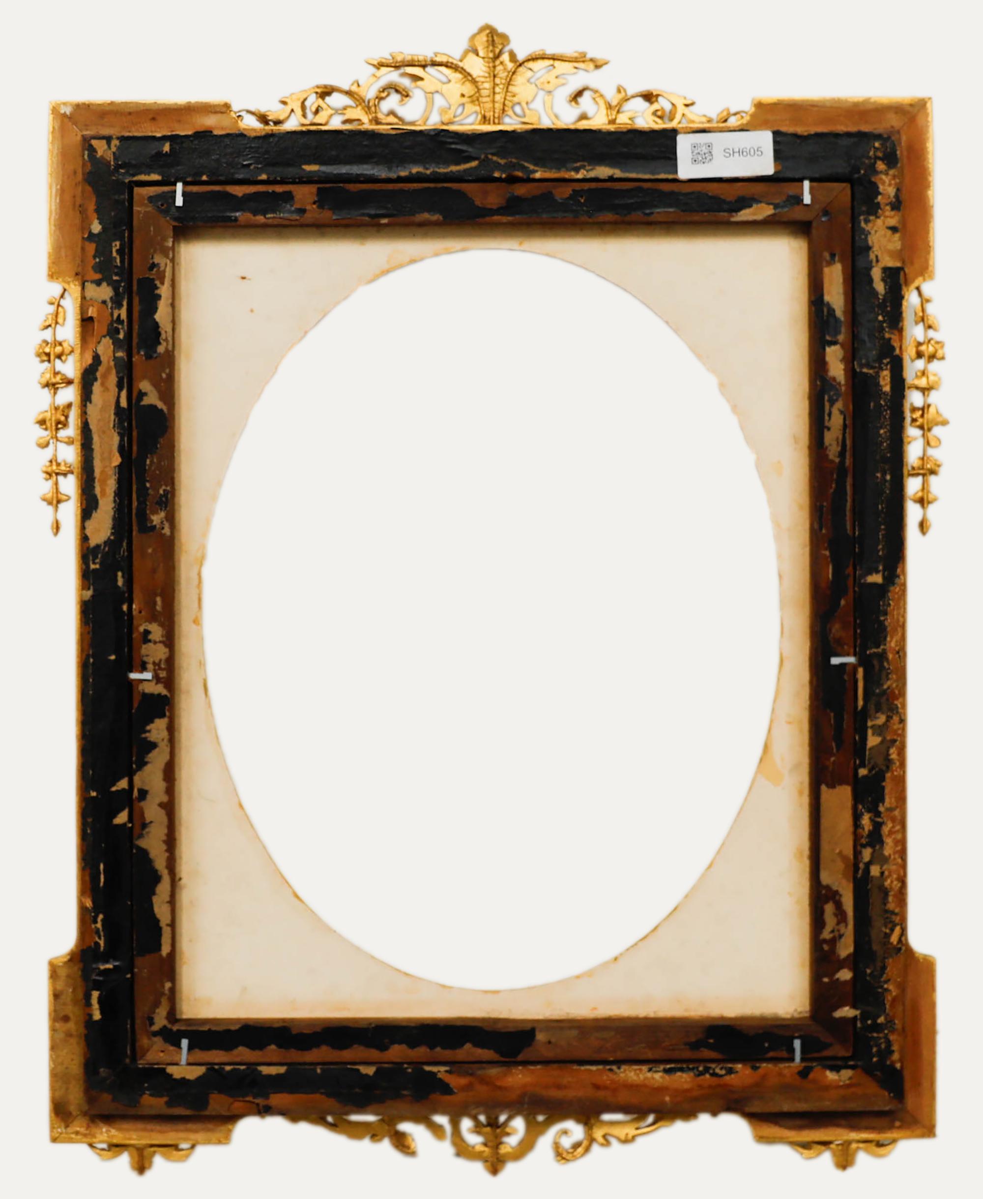 A beautifully ornate oval picture frame with water gilding. The frame is adorned with delicate floral details and sports a foliate cartouche. This would have been originally presented in a velvet-lined box which has unfortunately been lost.  
Frame: