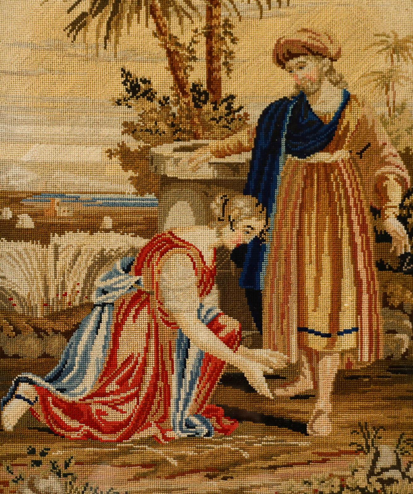 Une charmante broderie représentant l'histoire biblique de la Genèse 24:11-22 'Rebecca et le puits'. Non signée. Bien présenté dans un cadre doré balayé avec des moulures ornées de feuillages. Sur le coton.