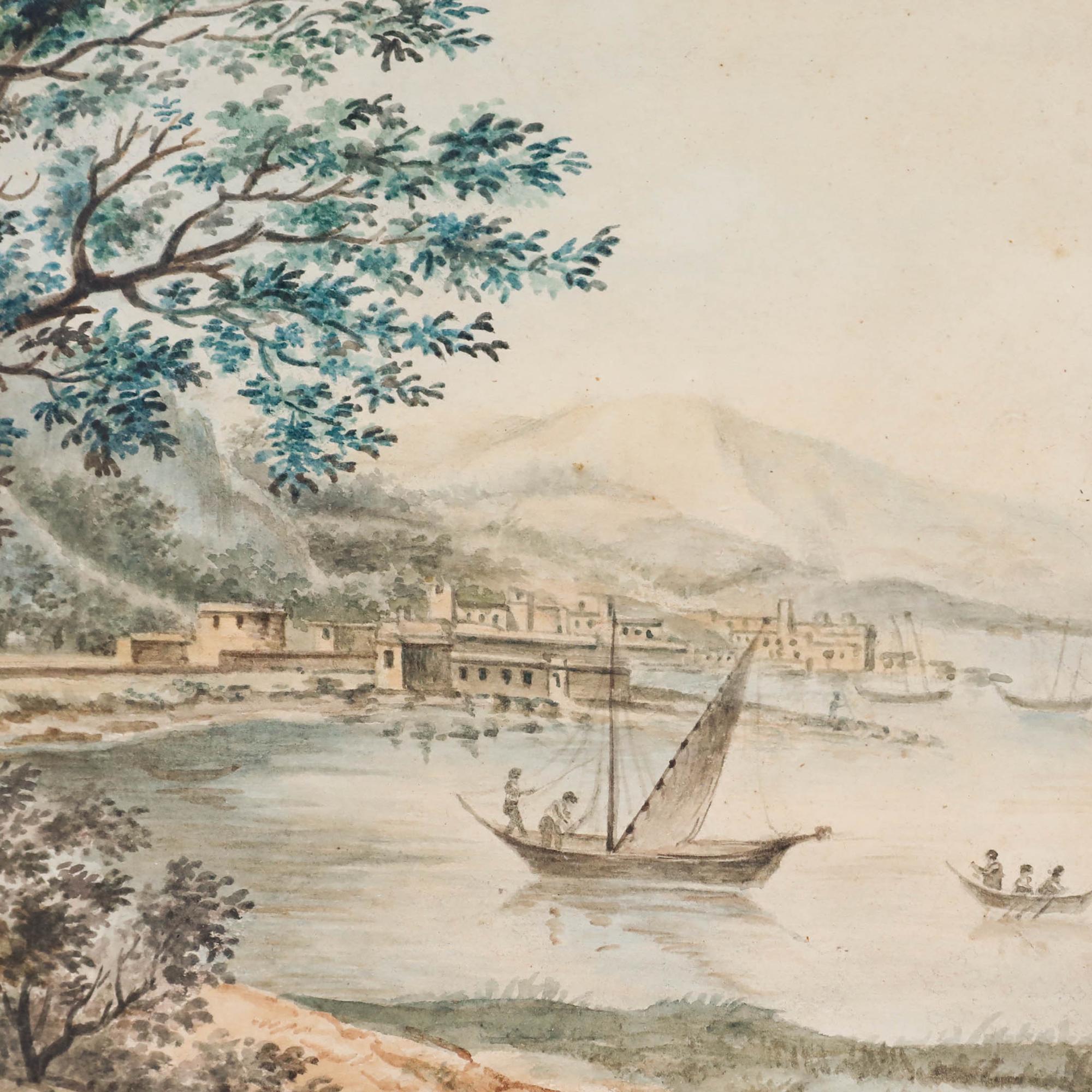 This delicate 19th-century watercolour features a serene coastal scene dominated by a graceful tree in the foreground, its detailed branches and foliage creating a natural frame for the composition. Unsigned. Inscribed verso. Well presented in a