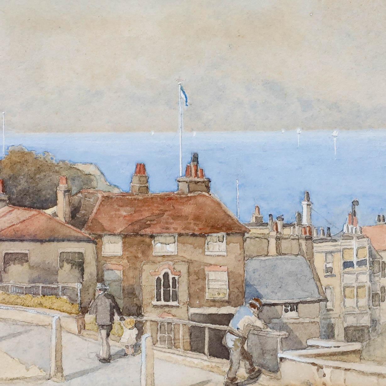 This delightful watercolour study depicts a charming coastal town scene, with clustered buildings leading down to a serene blue sea dotted with distant sailboats. The artist has skilfully captured the atmosphere of a quaint seaside community,