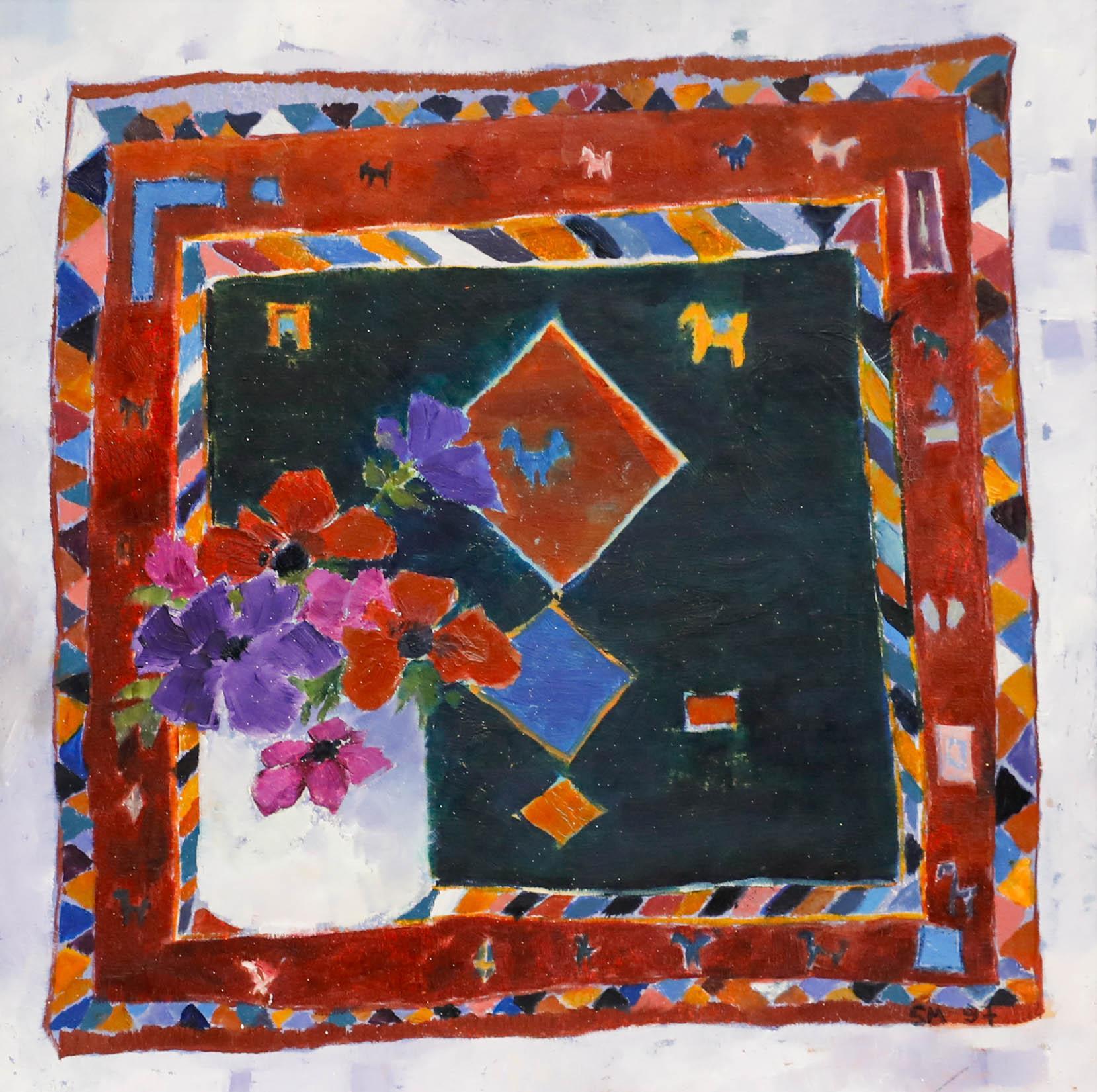 Eine lebhafte Komposition aus dem 20. Jahrhundert mit getopften Anemonen auf einem reich gemusterten Perserteppich. Das Gemälde ist in einem naiven Stil mit einer unkonventionellen Perspektive gemalt und fängt die Szene mit Charme und Originalität