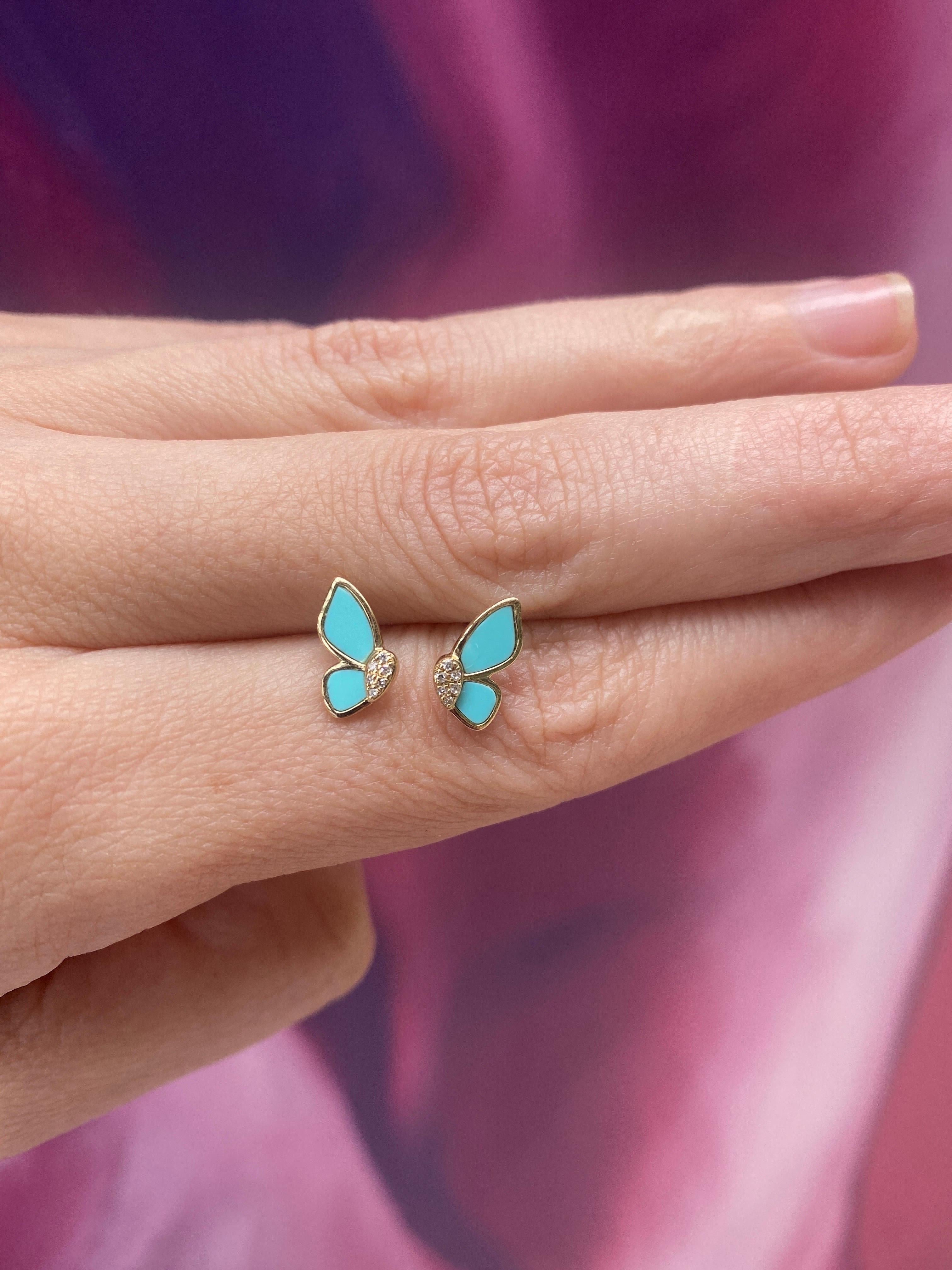These fun and unique stud earrings feature turquoise enamel and 0.02 carat total weight in round diamonds set in 14 karat yellow gold. Friction post with butterfly back. 
Measurements: Height 11mm