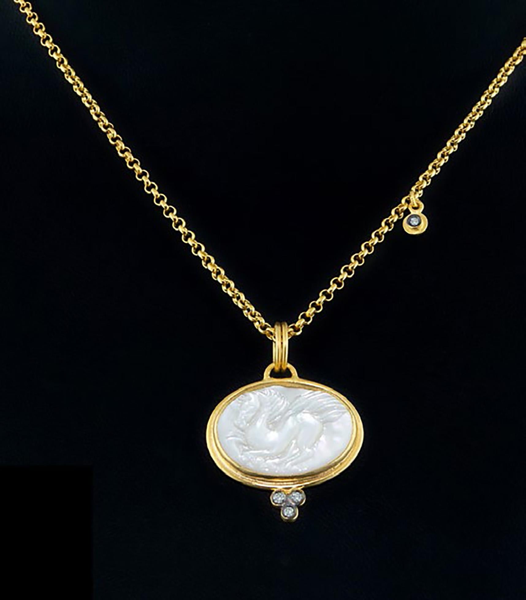 Round Cut 0.05 Carat Diamond, 24K Yellow Gold Mother of Pearl Necklace with Pegsus Carving For Sale