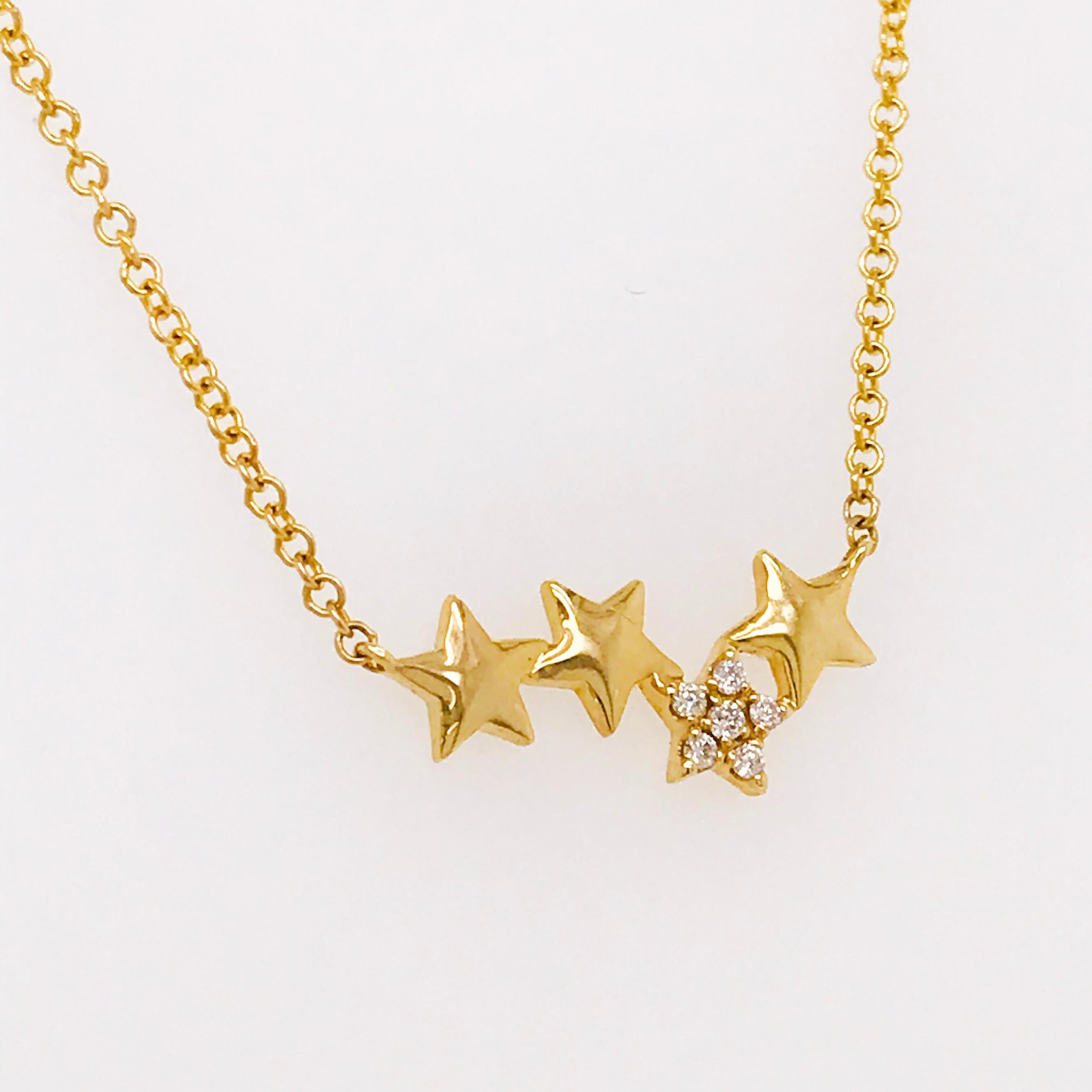 Cute, dainty, sparkly star necklace! This star necklace is adorable and shiny with 6 round brilliant diamonds making one of the four stars shine brightest! This is a 14k yellow gold asymmetrical, astrological diamond pendant. With four stars
