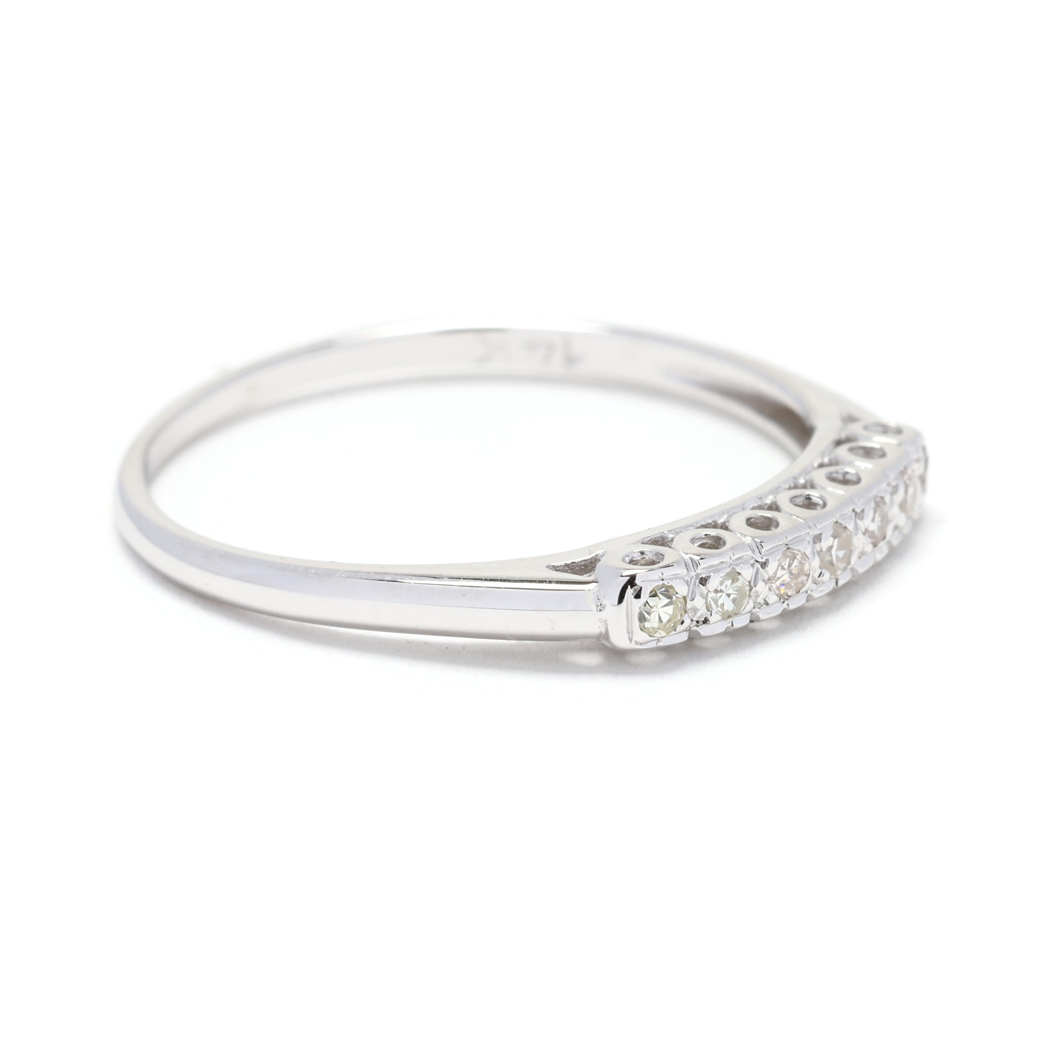 This stunning 0.05 carat total weight diamond wedding band is a beautiful symbol of your eternal love. Crafted in 14k white gold, this ring features a row of square-cut diamonds that are delicately prong-set for maximum sparkle and brilliance. The