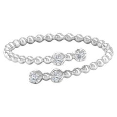 0.06 Carat SI Clarity HI Color Round Brilliant Diamond Wrap Ring 18k White Gold