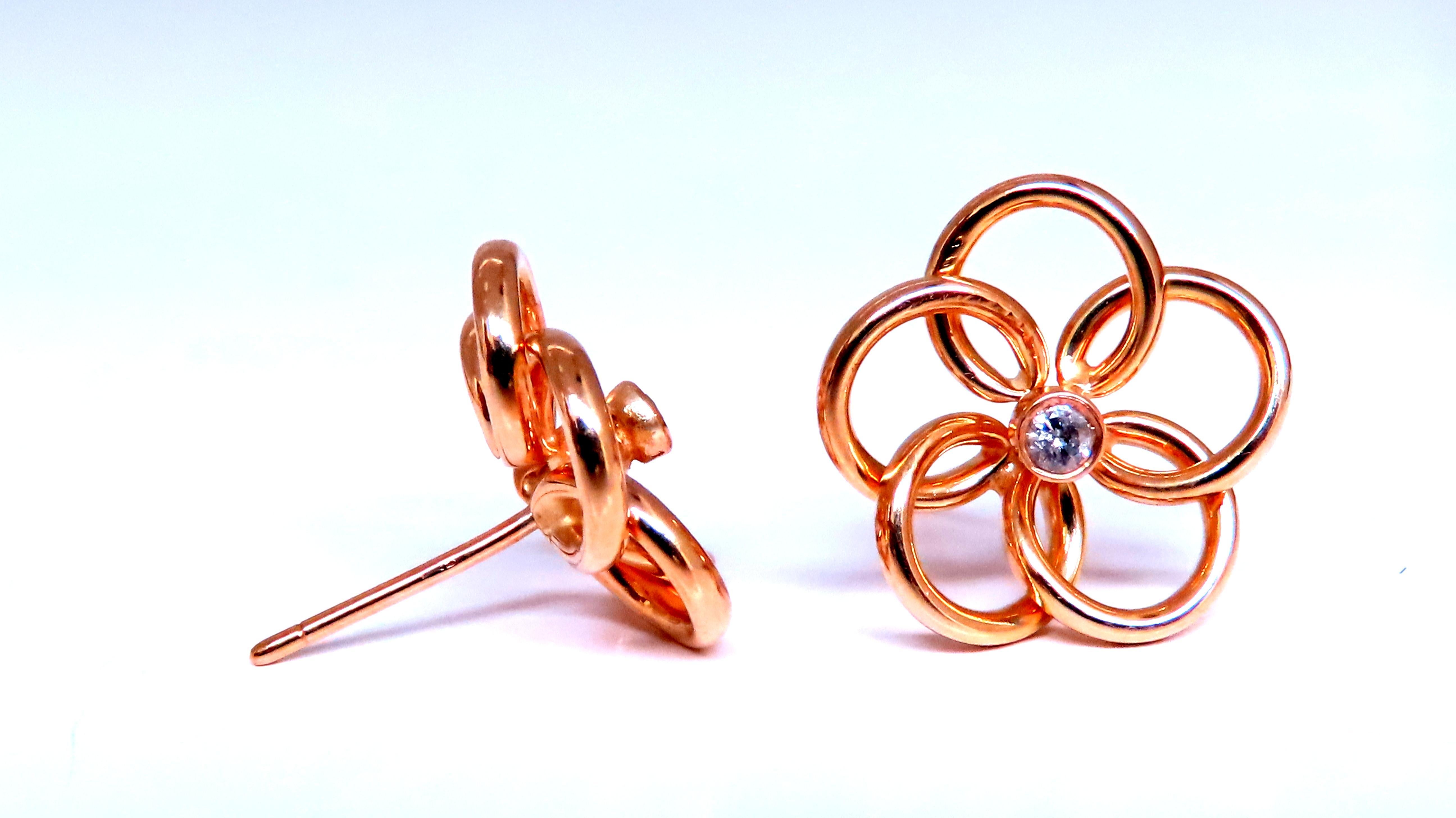 cosmic cluster orbital loop earrings 
0.06ct natural diamonds 
k-color i-2 clarity 
earrings: 11mm diameter
14kt yellow gold 1.8 inches
