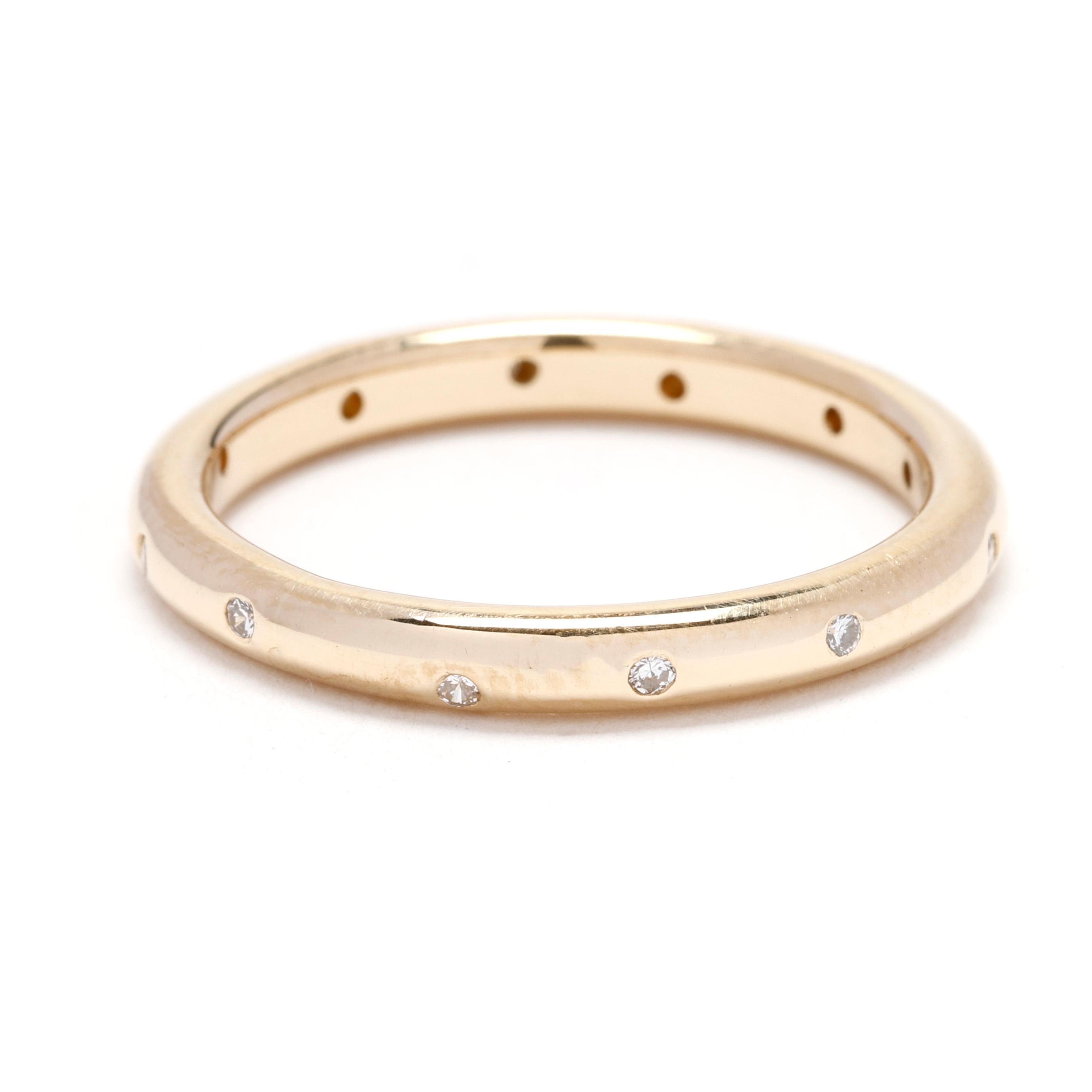 Discover understated elegance with this delicate 0.06ctw Scattered Diamond Band Ring. Crafted in luxurious 18k yellow gold, this minimalist ring features a unique design with scattered diamonds, creating a subtle yet captivating sparkle that is both