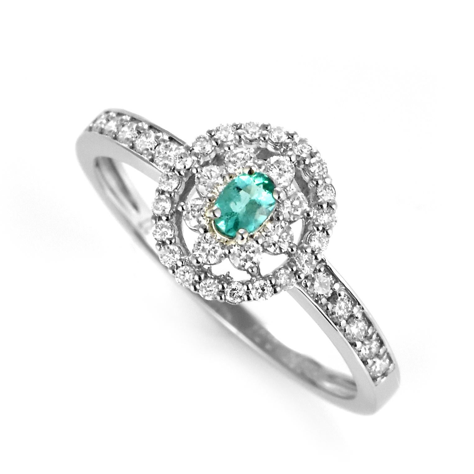 Ein wunderschöner Ring mit einem natürlichen brasilianischen Paraiba-Turmalin von 0,07 Karat und Diamanten von 0,27 Karat, gefertigt in Platin. Paraiba-Turmaline wurden erst vor 30 Jahren in dem gleichnamigen brasilianischen Bundesstaat Paraiba