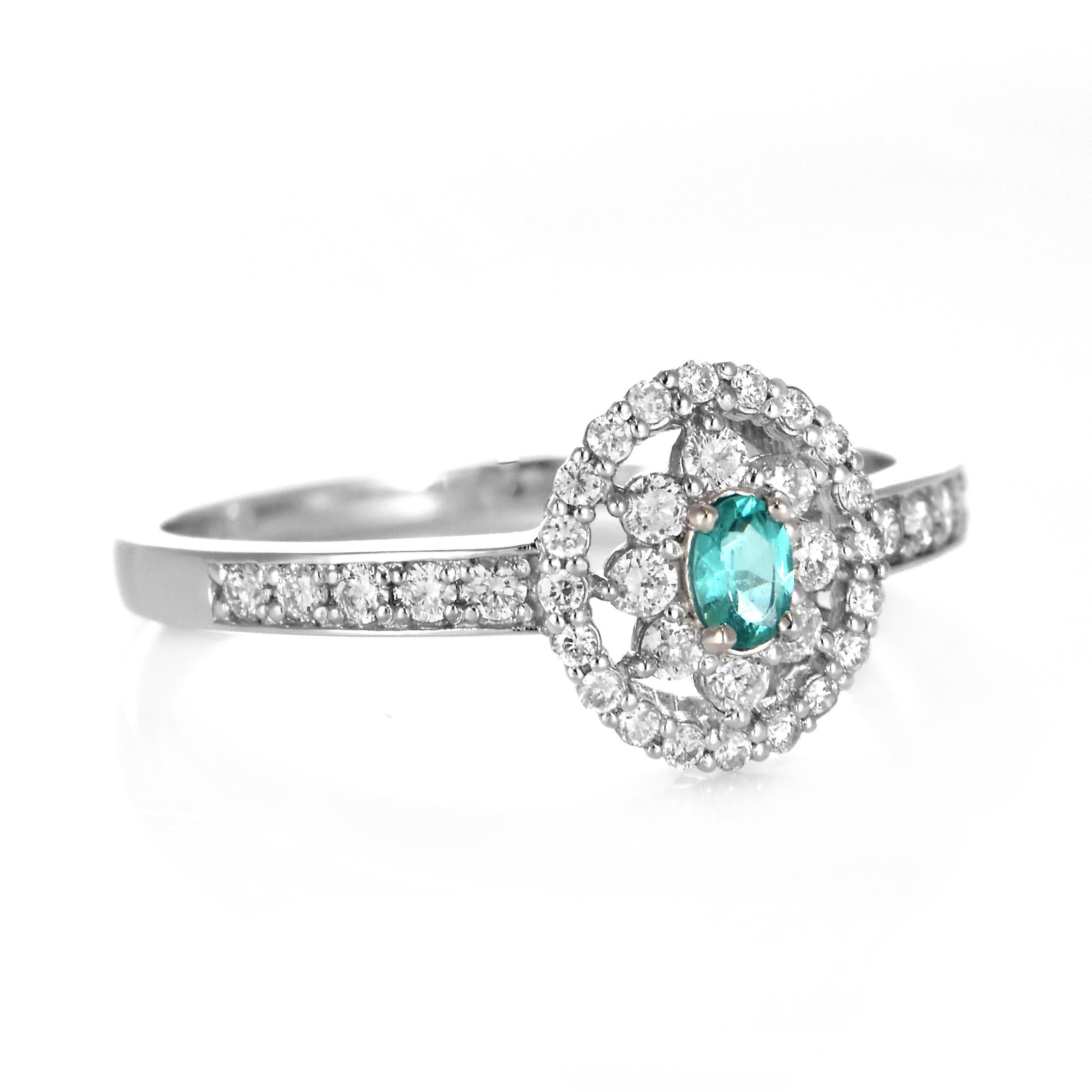 Ring aus Platin mit 0,07 Karat brasilianischem Paraiba-Turmalin und Diamanten (Ovalschliff) im Angebot