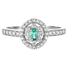 Ring aus Platin mit 0,07 Karat brasilianischem Paraiba-Turmalin und Diamanten