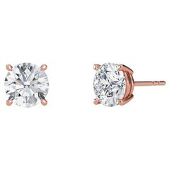 0.07 Carat TW Natural Diamond 14k Gold Four Prong Stud Earring