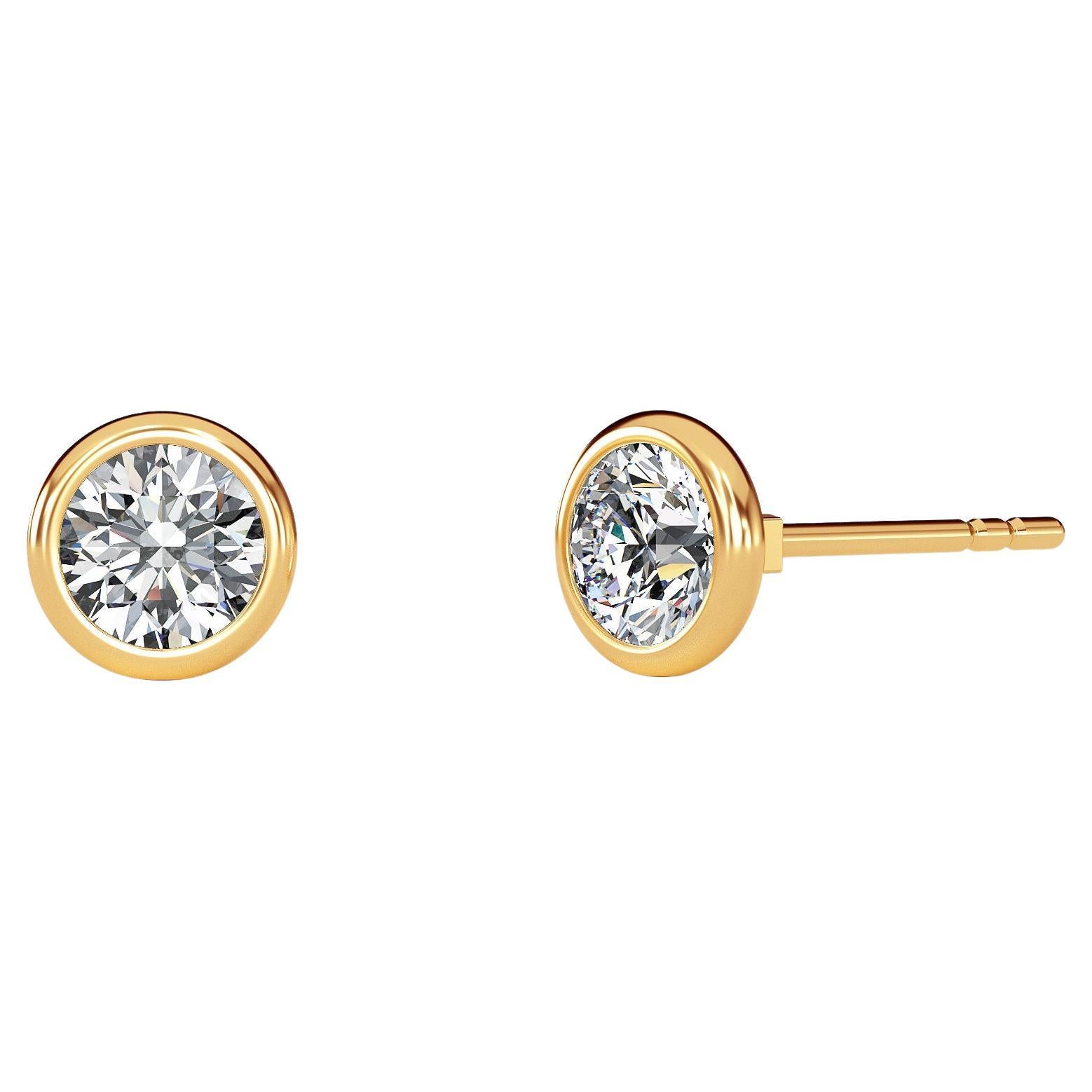 0.07 Carat TW Natural Diamond 14k Gold Bezel Setting Stud Earring For Sale
