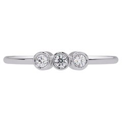 0.07 CTW Three Stone Diamond Ring in 14K Gold, SI1+ Bezel Set Band
