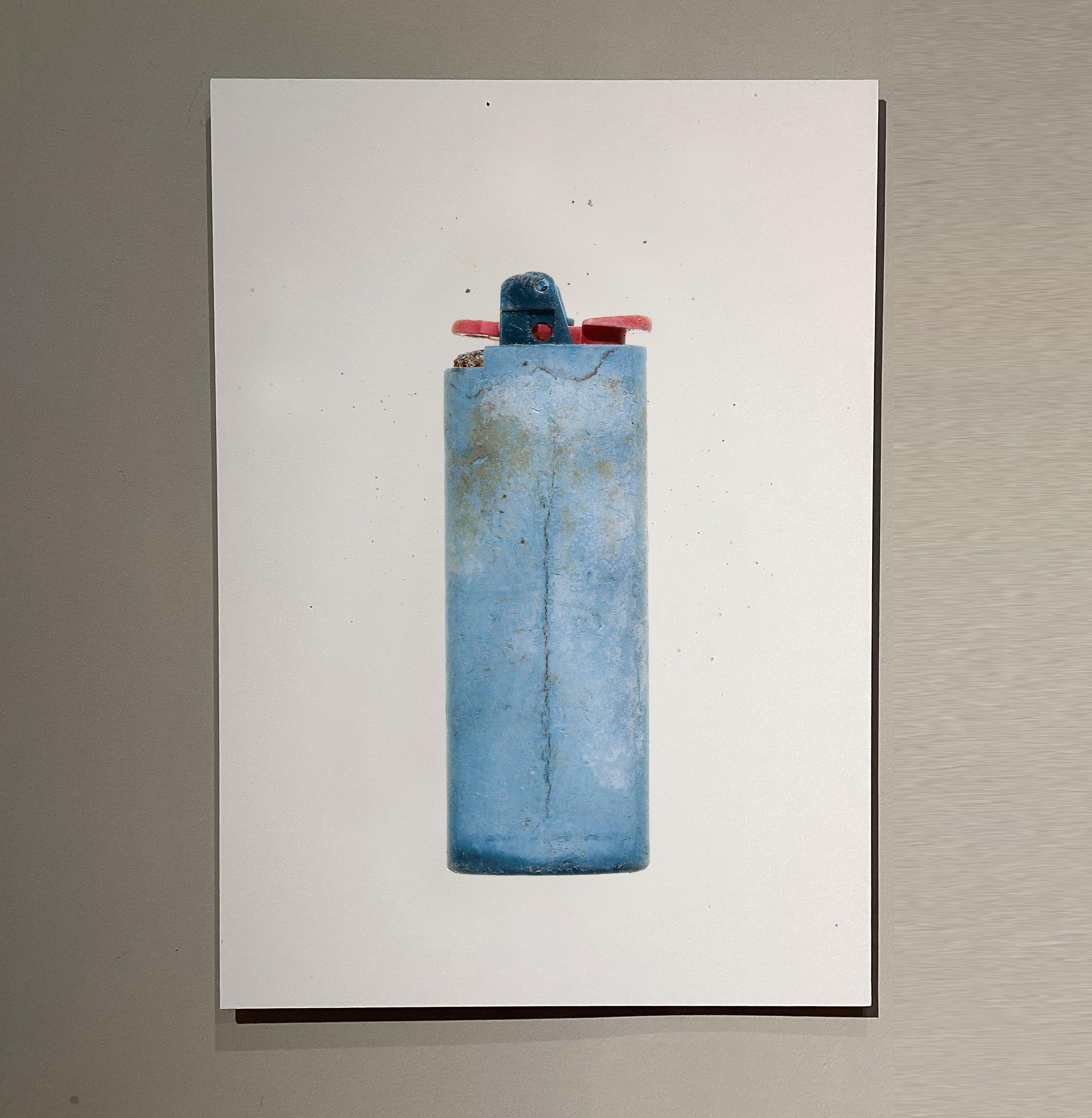 Found-object photograph: lighter recovered on the north coast of Menorca (Balearic Islands).

Original giclée printed on Hahnemühle FineArt Photo Rag 308 gsm — white, matte, acid-free, 100% cotton.

There are places that call to you—sites with a