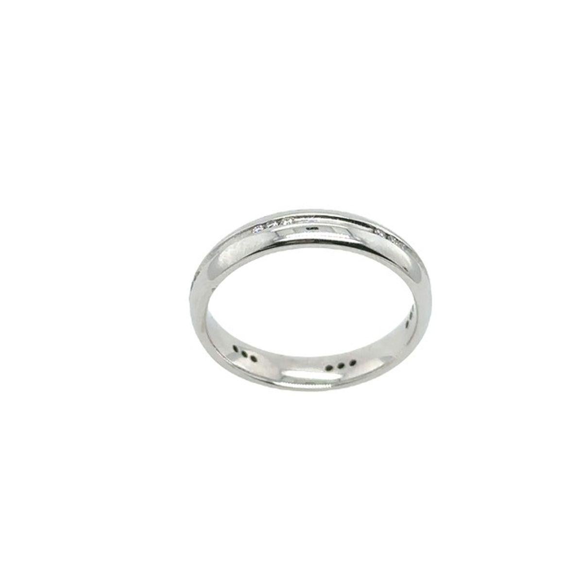Classic 4mm Court Shape Wedding Band, Set With 18 Round Diamonds,0.07ct

This 4mm court shape wedding band is set with 18 round diamonds weighing 0.07ct in 18ct white gold. It is a classic wedding band to symbolize an everlasting love. The grooved