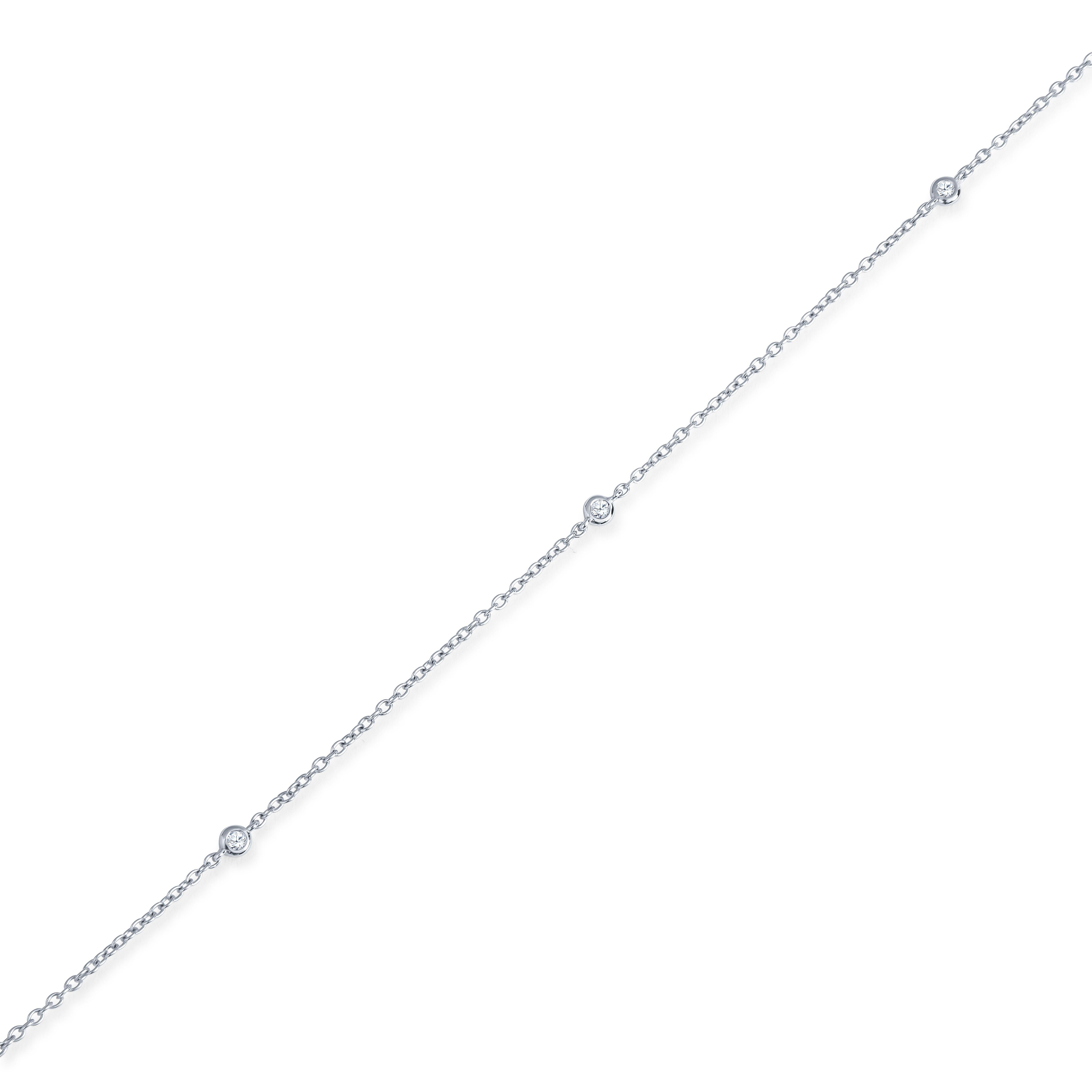 This station necklace is part of our Soft Glamour collection. It features 4 round brilliant, bezel set diamonds with a 0.07ct total weight. These diamonds are set in an 18kt white gold 17.5 inch cable chain. It is the ideal necklace to add elegance
