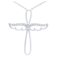 Collier croix d'ailes en or blanc 14 carats et diamants 0,08 carat