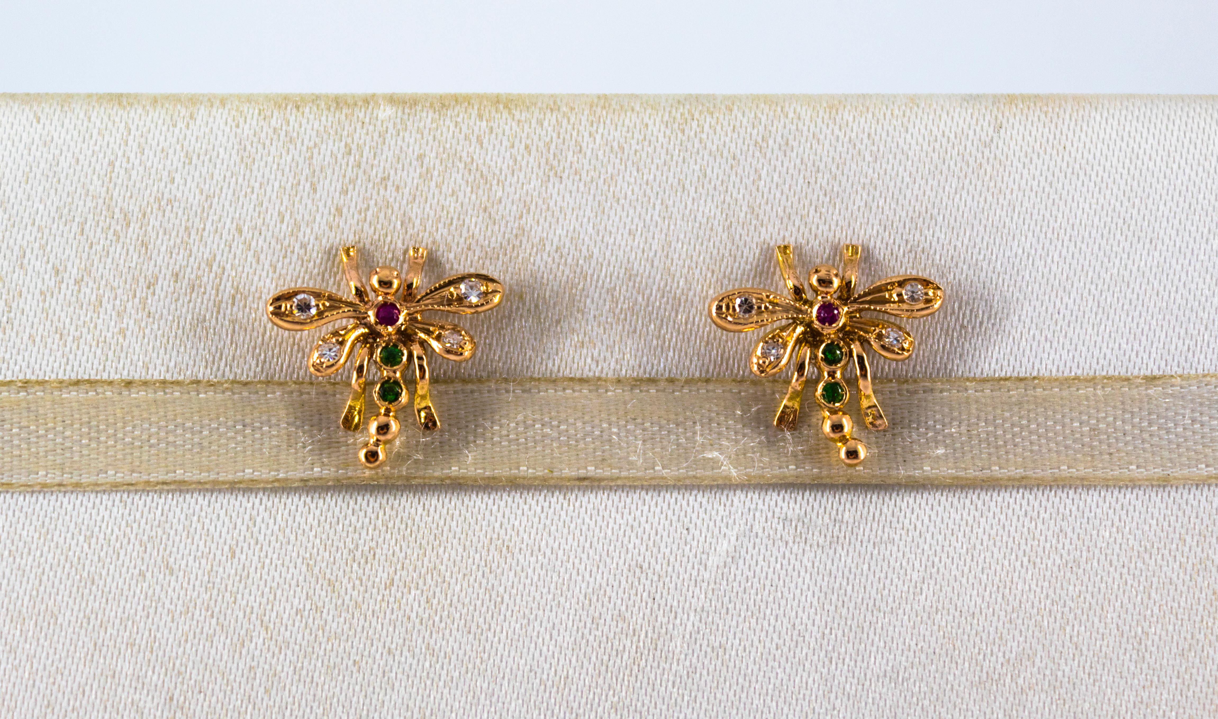 These Stud Earrings are made of 14K Yellow Gold.
These Earrings have 0.08 Carats of White Diamonds.
These Earrings have 0.04 Carats of Emeralds.
These Earrings have 0.02 Carats of Rubies.
These Earrings are available also with Blue Sapphires.
All