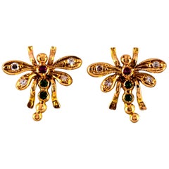 0.boucles d'oreilles libellules en or jaune avec diamant blanc de 08 carats et émeraude de 0::06 carat