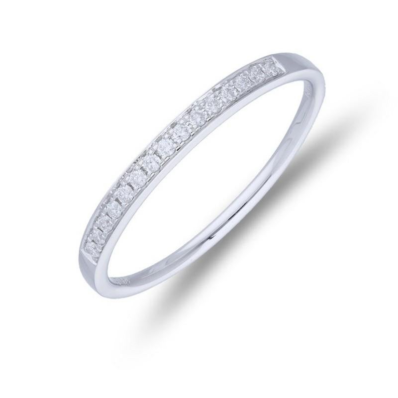 Diamond Total Carat Weight: This elegant 1981 Classic Collection wedding ring features a total carat weight of 0.09 carats, showcasing 15 petite round diamonds that add a touch of sparkle and sophistication.

Gold Setting: Crafted with precision in