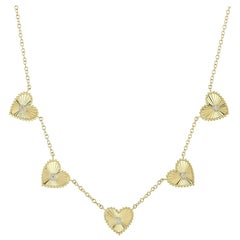 0.09 Round Brilliant Cut Diamond Fluted Heart Necklace