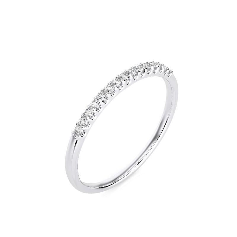 Diamond Total Carat Weight: This elegant 1981 Classic Collection wedding ring features a total carat weight of 0.1 carats, showcasing 15 excellent round diamonds that add a touch of sparkle and sophistication.

Gold Setting: Crafted with precision