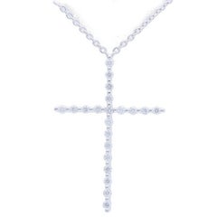 Collier croix en or blanc 14 carats et diamants 0,1 carat