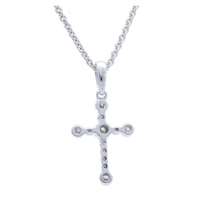 Diamond Carat Weight: This graceful cross pendant features a total of 0.1 carats of diamonds. The diamonds, carefully selected for their brilliance, consist of 12 round-cut stones. Each diamond contributes to the overall sparkle and elegance of the