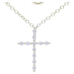 Collier croix en or jaune 14 carats et diamants 0,1 carat 