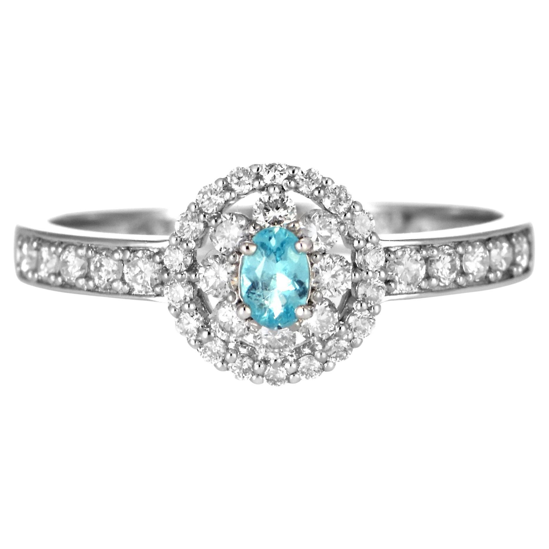 Ring aus Platin mit 0.10 Karat brasilianischem Paraiba-Turmalin und Diamanten