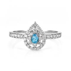 0.10 Carat Natural Brazilian Paraiba Tourmaline & Diamond Ring Made in Platinum