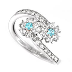 0.10 Carat Natural Brazilian Paraiba Tourmaline & Diamond Ring Made in Platinum